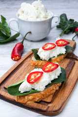 sandwich with cottage cheese, spinach and chili