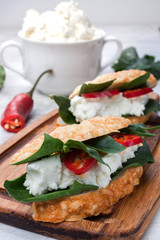 sandwich with cottage cheese, spinach and chili