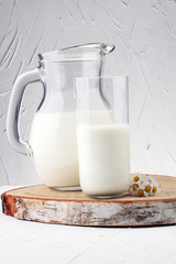 Milk jug and glass milk - healthy lifestyle concept