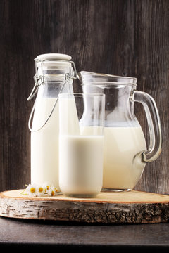 Milk jug and glass milk - healthy lifestyle concept
