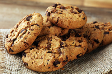 Chocolate cookies on wooden table. Chocolate chip cookies shot