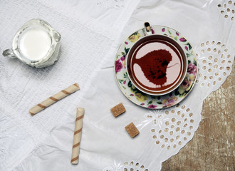Cup of tea with leaf
