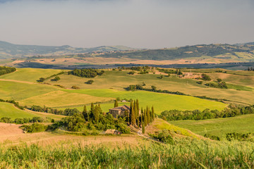 Idyllic panorama of the valley of the orcia in tuscan province of siena in summer with cultivated fields