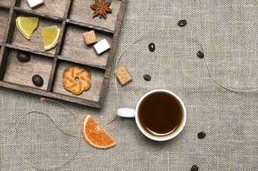 Cup of coffee, candies, coffee