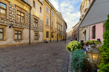Fototapeta premium Street caffe in old Krakow in the evening.