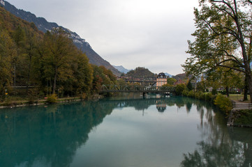 Fototapeta na wymiar Aquamarine lake in alpine town