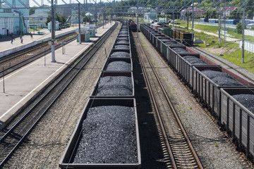 Railroad train with coal - obrazy, fototapety, plakaty