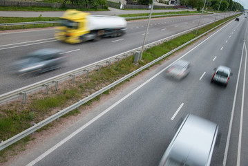 Fototapeta premium Traffic on highway, motion blur