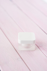 Skincare Product for facial on a light pink background