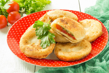 Delicious vegetable pies with tomatoes and cheese