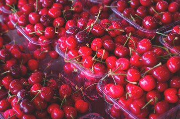 Cherries for sale on farmer's market. Agriculture background. Top view. Close-up