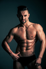 Fototapeta na wymiar bodybuilder with muscular body in underwear pants