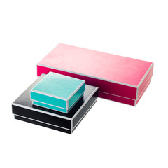 colored jewelry boxes ower white background