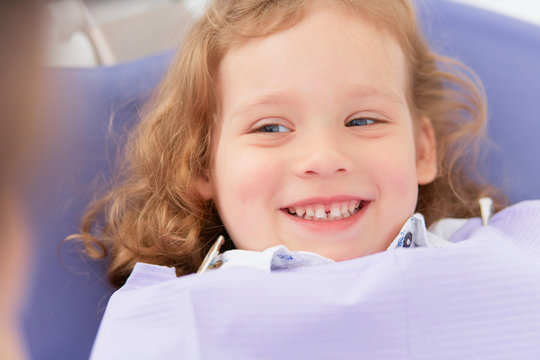 Smiling girl at dentist