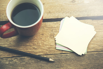 Office table with papers and coffee cup