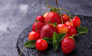 Fresh ripe strawberry and cherry