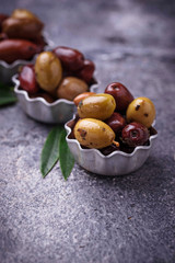 Bowls with different Mediterranean olives