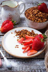 Granola with yogurt and strawberries