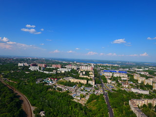 Obraz premium Aerial view. Houses, railway, road and traffic in the city Dnepr, Ukraine.