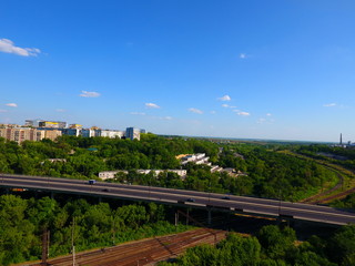 Obraz premium Aerial view. Houses, bridge and traffic in the city Dnepr, Ukraine.