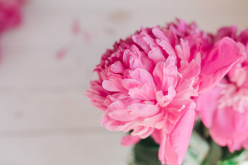 Bouquet of pink peonies on a wooden table. Gift Valentine's Day.Flowers background