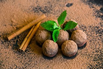 Chocolate truffle. Chocolate sweets from truffles with cocoa powder. Balls of fresh energy with...