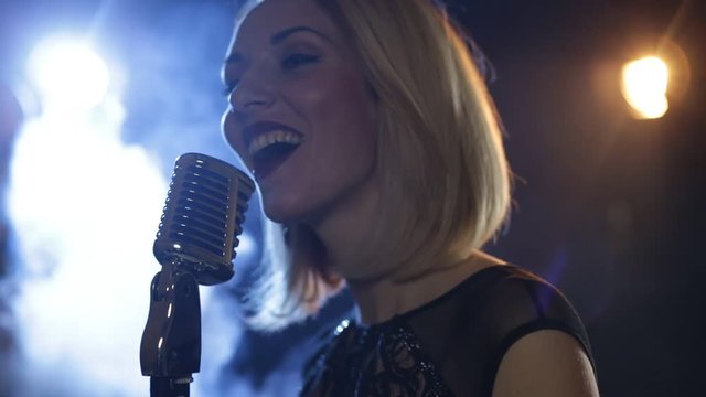 Woman with retro style microphone