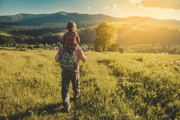 Son with father on mountain