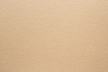 Fototapeta na wymiar Brown cardboard sheet abstract texture background