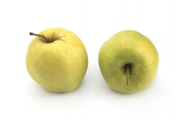 Green apples on a white background