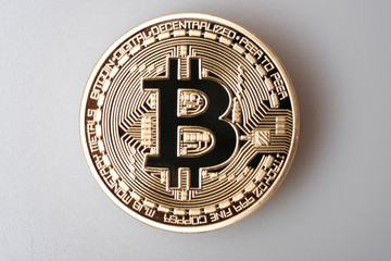 Golden bitcoin isolated on white background