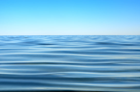 Fototapeta Panorama of sea waves against the blue sky