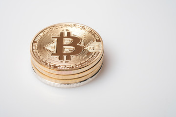 Golden bitcoin isolated on white background