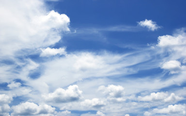 Fantastic soft white clouds against blue sky