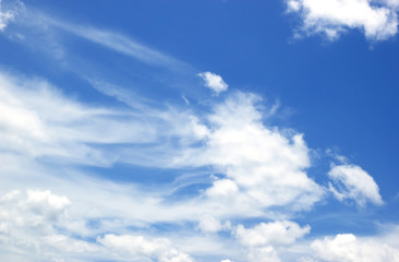 Fantastic soft white clouds against blue sky