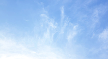Fantastic soft white clouds against blue sky