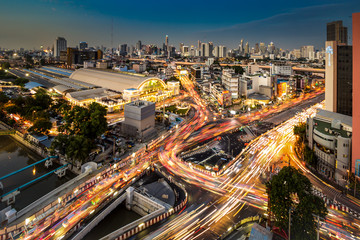 Fototapeta na wymiar Cityscape And Traffic On Road Near Bangkok Railway Station At Twilight