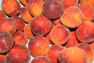 Close up of fresh and juicy peaches