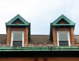 Peaked roof of old wooden house 