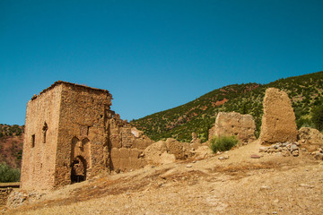 ruin of a kasbah against sky in a sunny day - bine el ouidane - morocco
