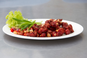 sour pork fried spare ribs on white dish