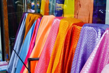 Obraz premium Colorful traditional embroidery fabric in market