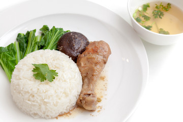 Rice with chicken drumstick served with soup