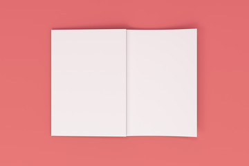Mockup of blank white open brochure lying with cover upside on red background