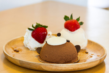 Chocolate cake with ice cream and strawberry