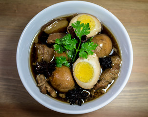 Eggs and pork in brown sauce frogs.