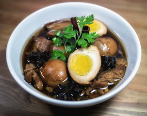 Eggs and pork in brown sauce frogs.