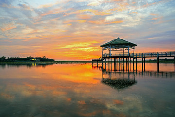 Sunset at the Pavilion on lake or pond or swamp of Bueng See Fai, Phichit, Thailand.