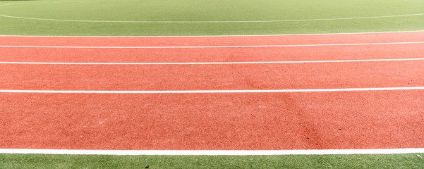 Background of atheletics running track.