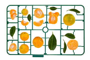 A studio photo of a plastic model kit Orange